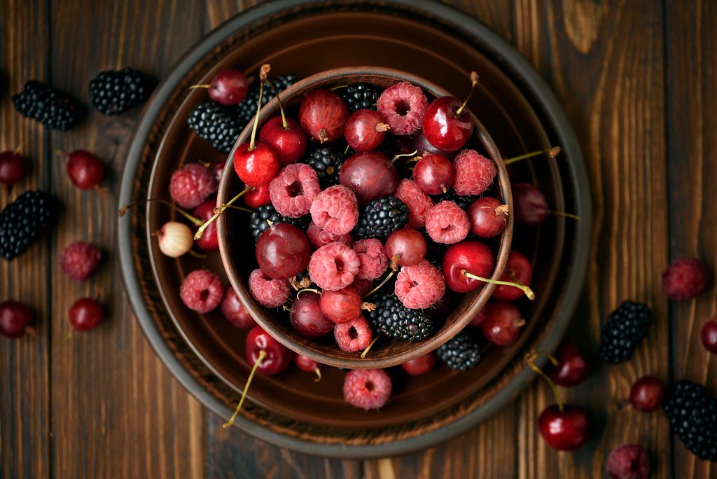 Where Is The Cherries And Gout Connection   Close Up Colorful Berries Assorted Mix Of Raspberry Blackberry Gooseberry And Sweet Cherry Selective Focus Stockpack Istock 1024x684 